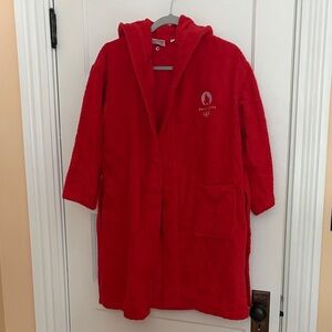 New without tag. 
Red Hooded Robe 2024 Olympic games logo. Size 10-12. Cotton
